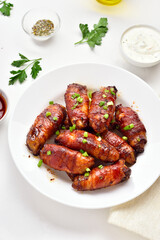Bacon wrapped grilled chicken wings
