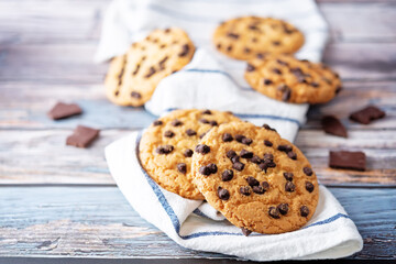 Cookies with chocolate drops on a background