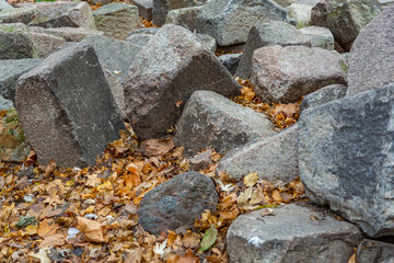 Untreated rough natural stone in everyday environment, gardening and landscaping