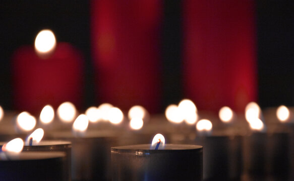 Many burning tealight candles stock images. Christmas still life with candles stock photo. Romantic still life with red candles stock images. Beautiful christmas candles stock images