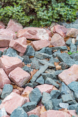 Untreated rough natural stone in everyday environment, gardening and landscaping