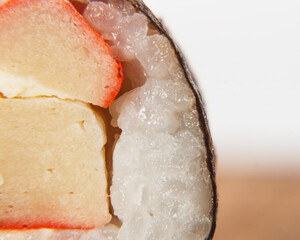 Closeup shot of fresh sushi roll on blurred background