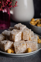 Traditional Turkish delight with hazelnut. Eastern dessert with hazelnut.