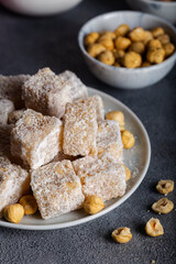 Traditional Turkish delight with hazelnut. Eastern dessert with hazelnut.