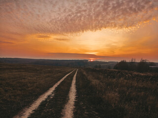 Obraz na płótnie Canvas sunset over the road