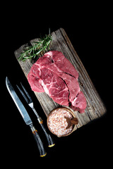 raw meat on  cutting board