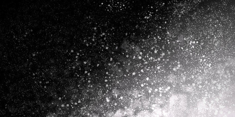 black-white grunge background dark with spots and grains. abstract simple backdrop for banners, web, prints