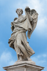 Fototapeta na wymiar Statue of an Angel on Sant'Angelo bridge in Rome