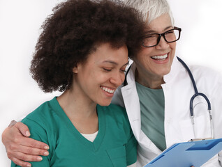 Happy laughing doctor and nurse . Diversity concept. Mentor support