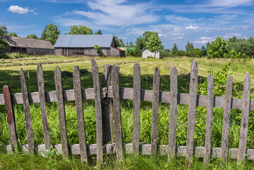 Wooden fence in rural area of Mazowsze region in Poland