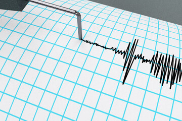 Seismograph tracing the curve that indicates seismic activity pen record the waves on the drum with...