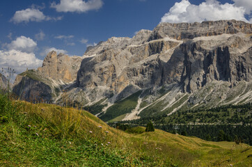 Sella group, plateau-shaped mountain massif in the Dolomites, north of the Marmolada and  east of Sasso Lungo, seen from the trail to Sella pass & Sella refuge from Comici refuge, South Tyrol, Italy.