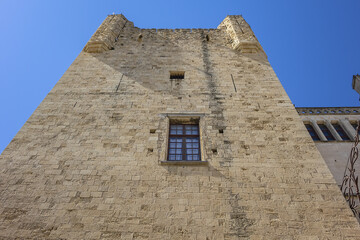 Fototapeta na wymiar Donjon Gilles Aycelin (42 meters) near Palace of the Archbishops (Palais des Archeveques) - high watchtower and prison built from 1295 to 1306 by Archbishop Gilles Aycelin. Narbonne, France.