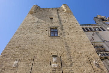 Fototapeta na wymiar Donjon Gilles Aycelin (42 meters) near Palace of the Archbishops (Palais des Archeveques) - high watchtower and prison built from 1295 to 1306 by Archbishop Gilles Aycelin. Narbonne, France.
