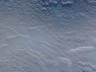 Background: Snow surface in Swiss Alps - nice waves in the frozen snow