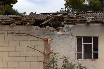 The damage of the war to the civilian population. Bombed civil buildings. War crime. Tartar, Azerbaijan - 10 October 2020.