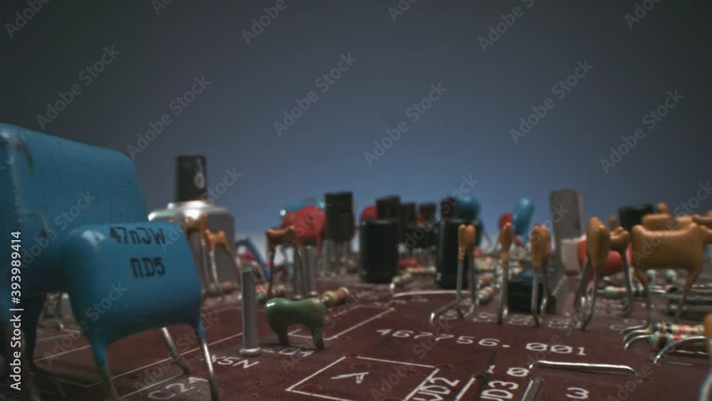 Poster dollying-out macro footage of motherboard of personal computer with closeup of details and microproc