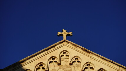 church roof with a sotne cross