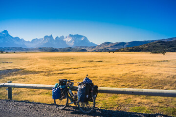 Fototapeta na wymiar Torres del Paine National Park / Magallanes y la Antártica Chilena Region / Chile - March 27, 2018: Bicycle tour going through the park.