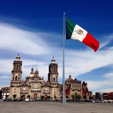 Mexican Flag Waving At Zocalo