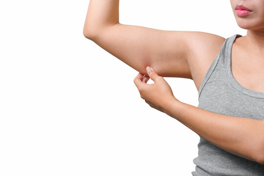 Asian woman pinching arm fat flabby skin isoloate on white background, with clipping path.