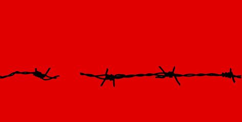  Rusty barbed wire isolated on a red background