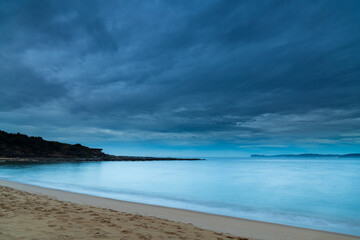 Overcast and threatening rain sunrise seascape