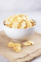 Emping mlinjo gepuk. Emping are a type of Indonesian chips, a bite-size snack kripik cracker, made of melinjo or belinjo (Gnetum gnemon) nuts (which are seeds).