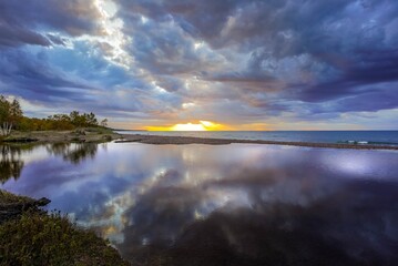 Bright dramatic sunset over Lake Superior at Eagle River in Michigan