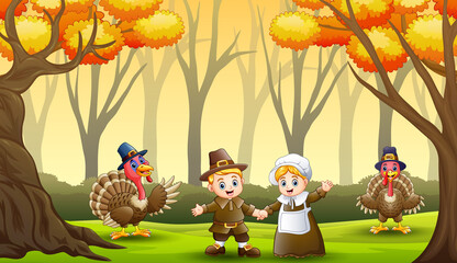 Pilgrim couple with turkey birds in the forest