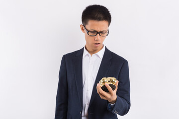 Man holding clock on white background. Time management concept