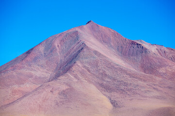 Fototapeta na wymiar Colored mountains in the Atacama desert with blue sky in Eduardo Avaroa Andean Fauna National Reserve, Bolivia