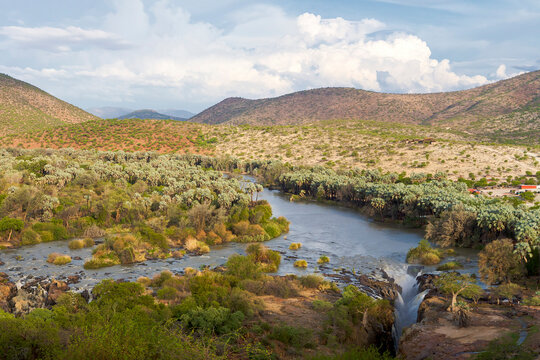 The Epupa Falls are created by the Kunene River on the border of Angola and Namibia, in the Kaokoland area of the Kunene Region.