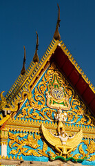 Golden temple in Thailand. - 394058894