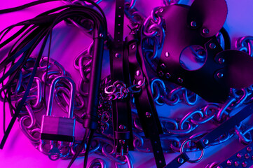 Set of erotic toys for BDSM. The game of sexual slavery with a whip, gag and leather blindfold. Intimate sex games © rotozey