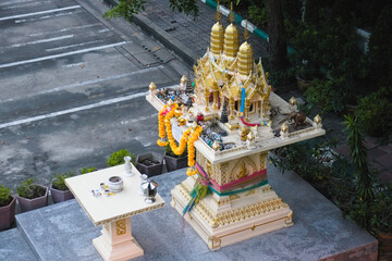 Traditional Thai golden spirit house.