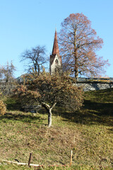 Bell tower of s.andrea church in autumn, S.Andrea village, Bressanone/Brixen, south tyrol, Italy
