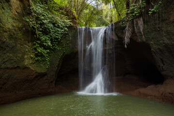 Beautiful waterfall in rainforest. Tropical landscape. Slow shutter speed, motion photography....