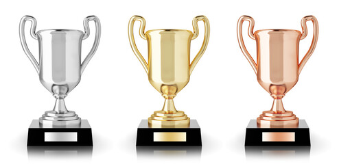 Golden, silver and bronze trophies isolated on white background. 3d rendering