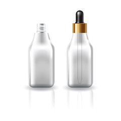Blank clear cosmetic square bottle with black-gold dropper lid for beauty product mockup template.