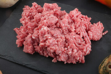 raw minced meat with fungus paprika zucchini and carrots