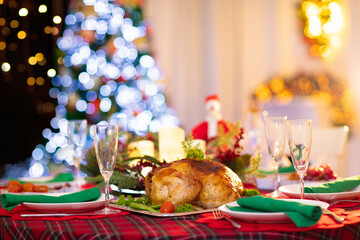 Christmas dinner at fire place and Xmas tree.