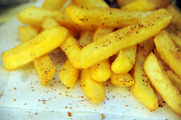 Crunchy fries with a dusting of Cajun spice