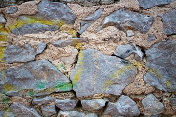 evocative image of wall with stones