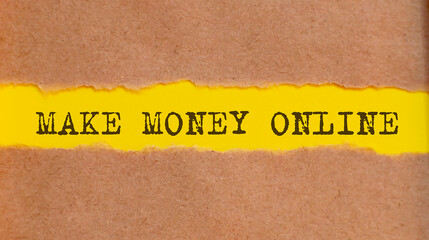 Make Money Online written under torn paper on yellow background