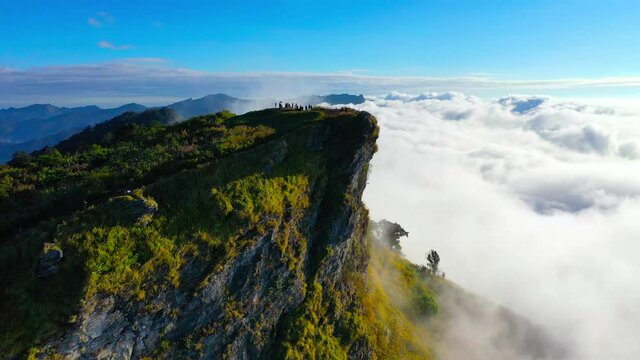 Sunrise and Mist mountain in Phu Chi Fa located in Chiang Rai, Thailand. Phu Chi Fa is the natural border between Thailand and Laos