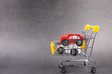 shopping cart with car, concept of buying car