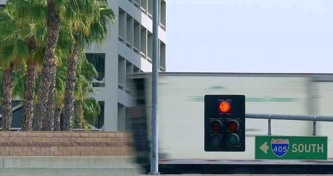 Traffic jam congestion and fast moving cars on world busiest 405 freeway during morning rush hour in Los Angeles, California, 4K