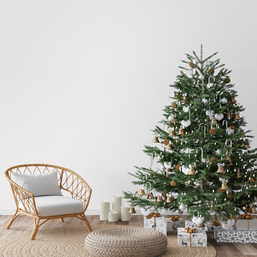 Living Room Christmas interior in Scandinavian style. Christmas tree with gift boxes. rattan chair on wall Mockup.	