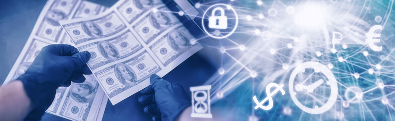 The concept of the global economic crisis. Illegal production of US dollars. Print money underground. Printing hundred dollar bills by a criminal.